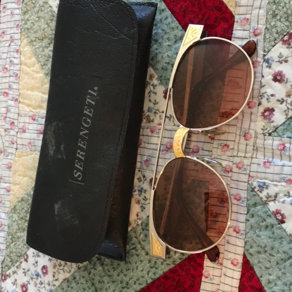 Vintage Serengeti glass sunglasses.